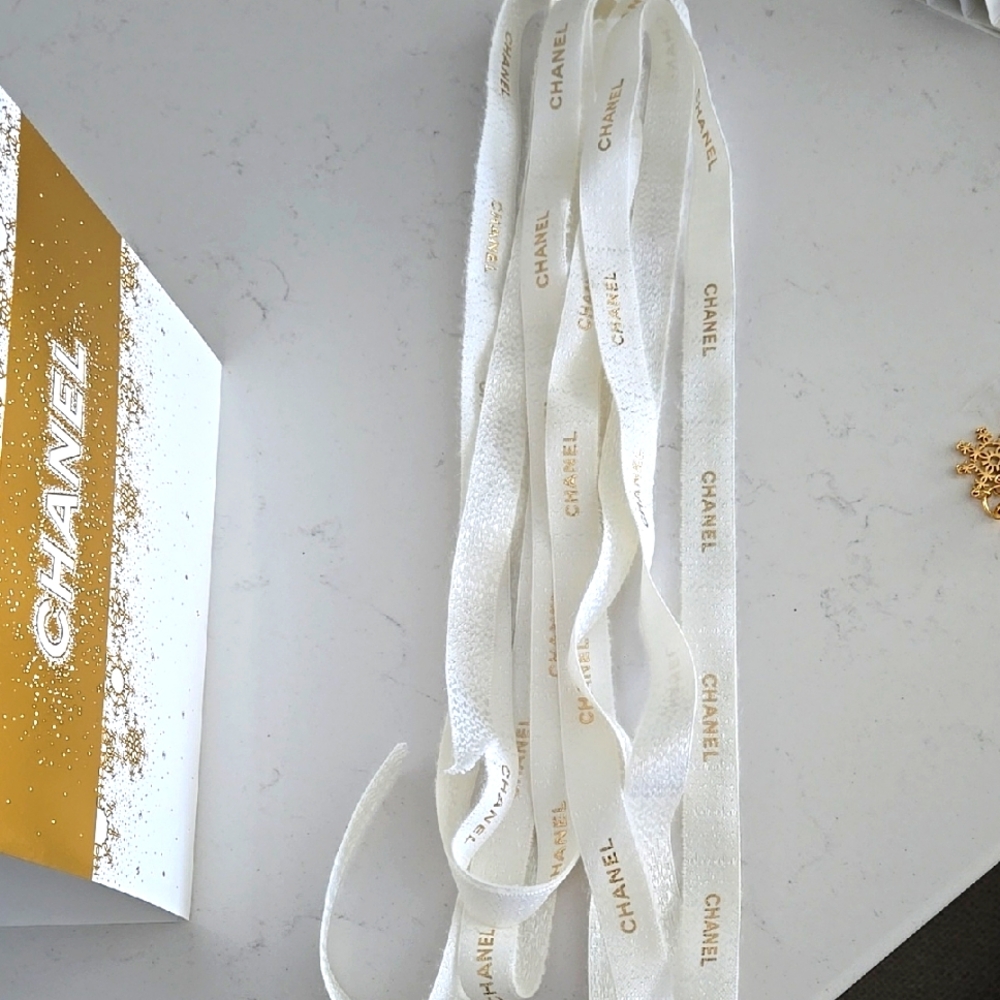 Chanel White Ribbon 200 inches w/ gold Chanel logo printed Chanel Holiday
